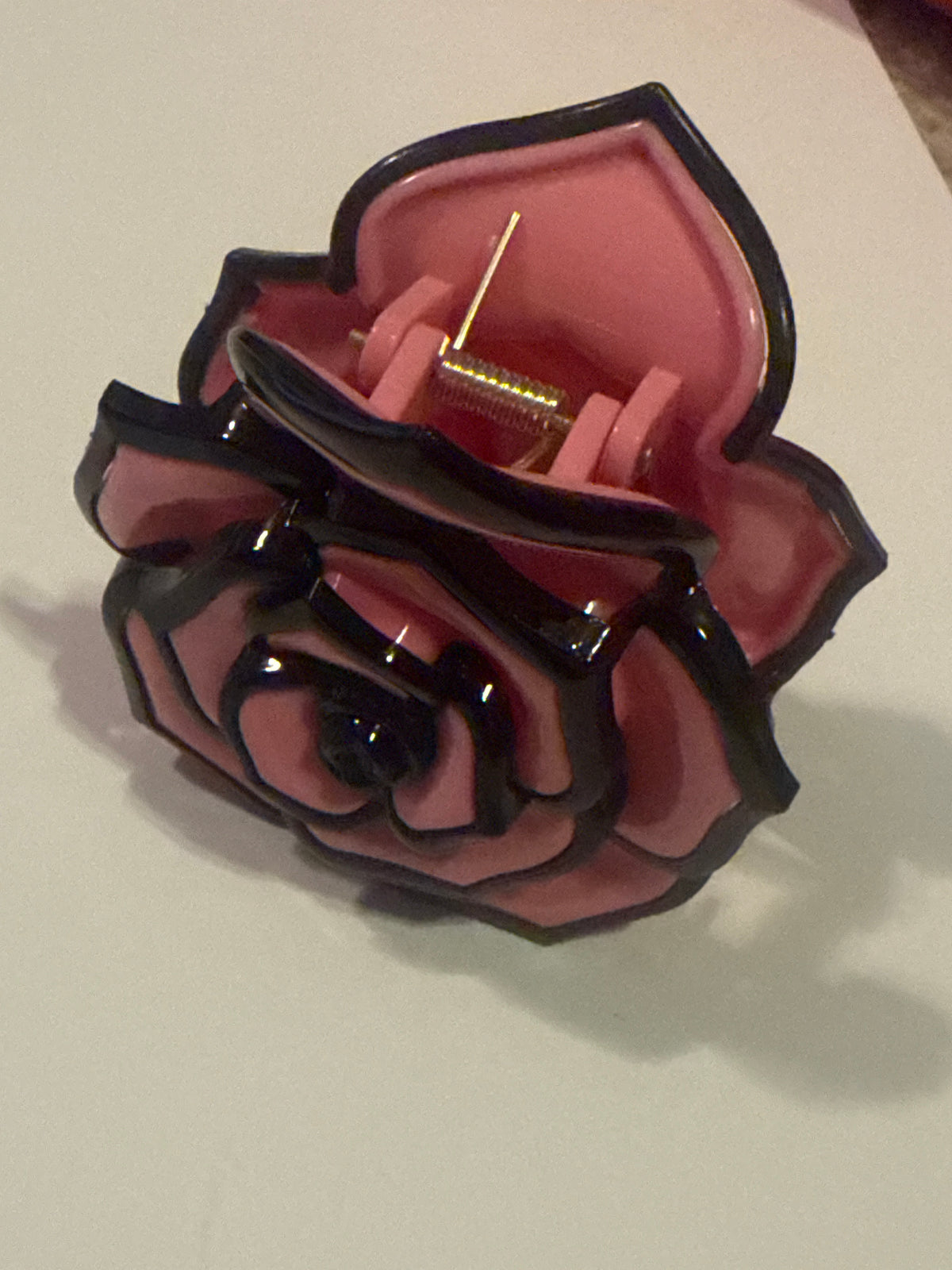 Beautiful pink and black flower clip